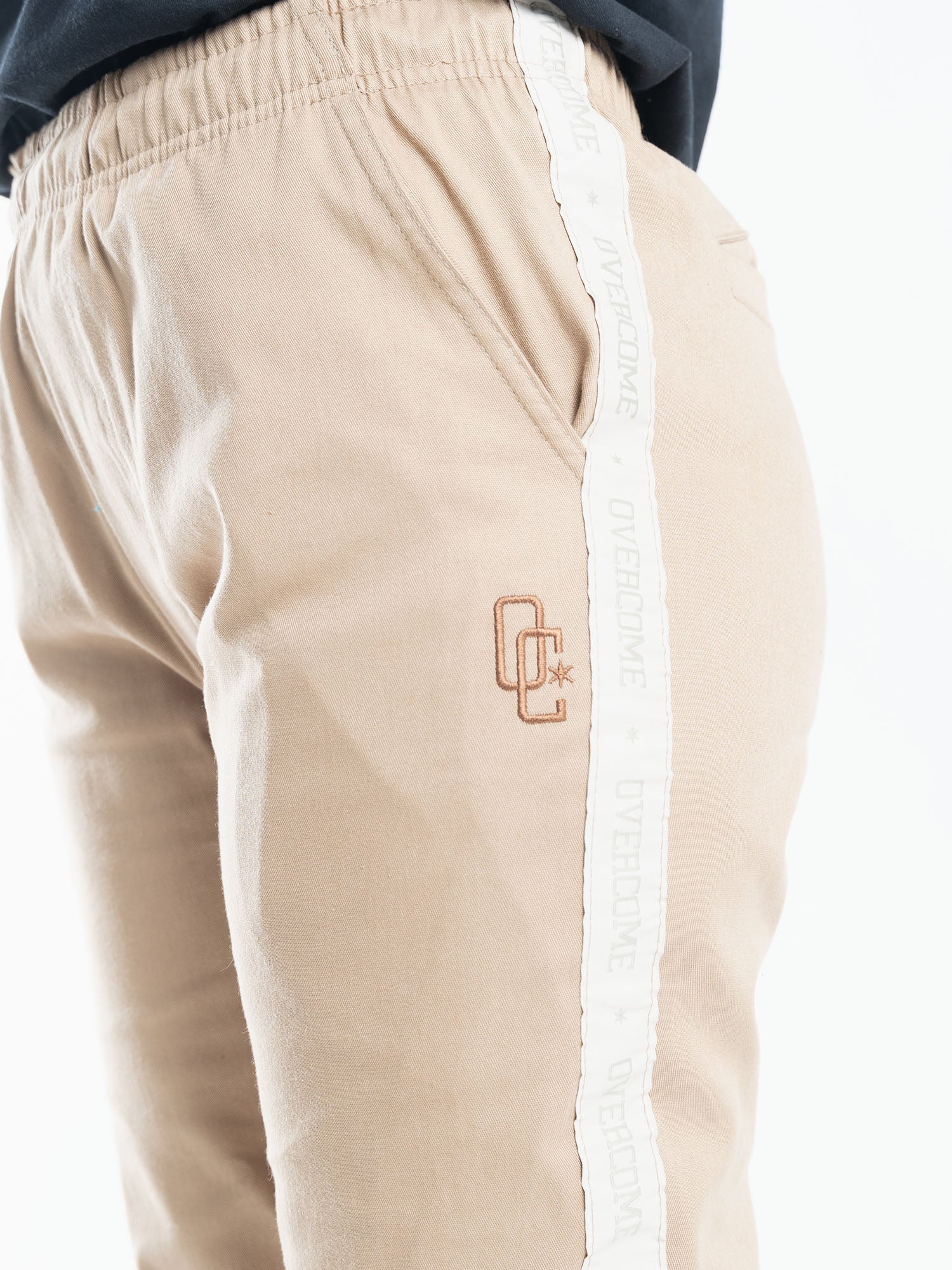 Calça Jogger Overcome Faixas Bege