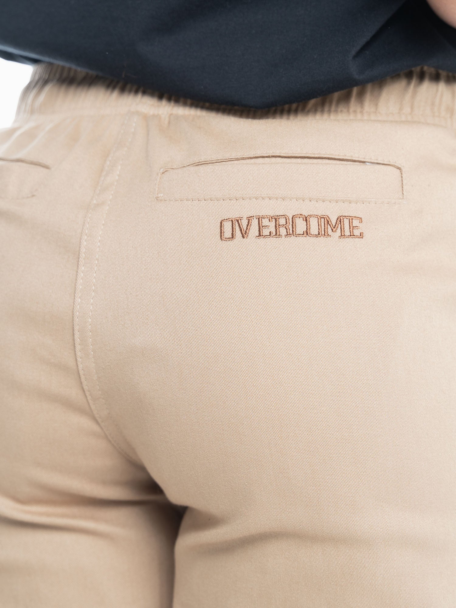 Calça Jogger Overcome Faixas Bege